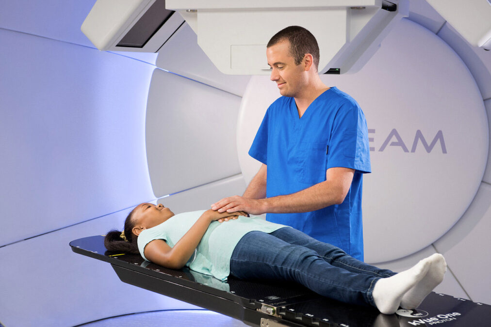 What is the difference between proton beam therapy and radiotherapy?
