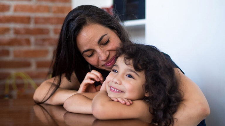 Paediatric patient and parent discussing proton beam therapy